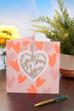 UK Greetings Mother's Day Card for Mum - Keepsake Heart Attachment Design