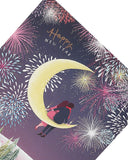 Couple Sitting On Half Moon New Year Christmas Card