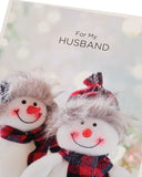 Fun Christmas Card for Husband – Snow Couple in Tartan Illustration